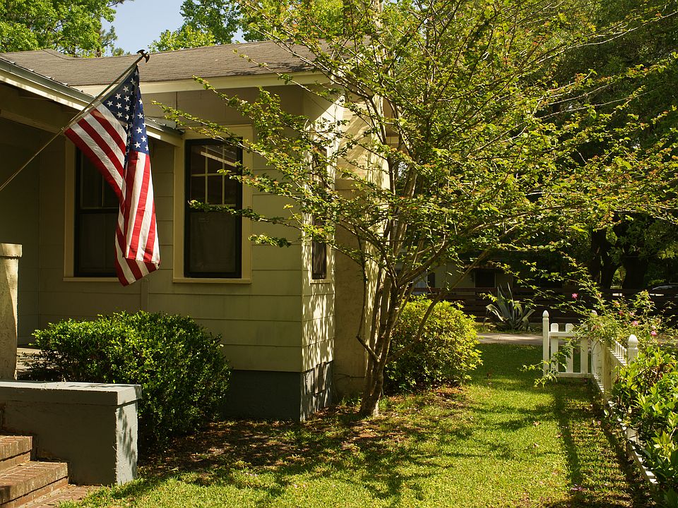Front yard inside fence.