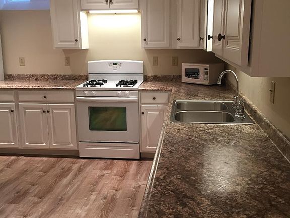 New countertops and flooring in kitchen