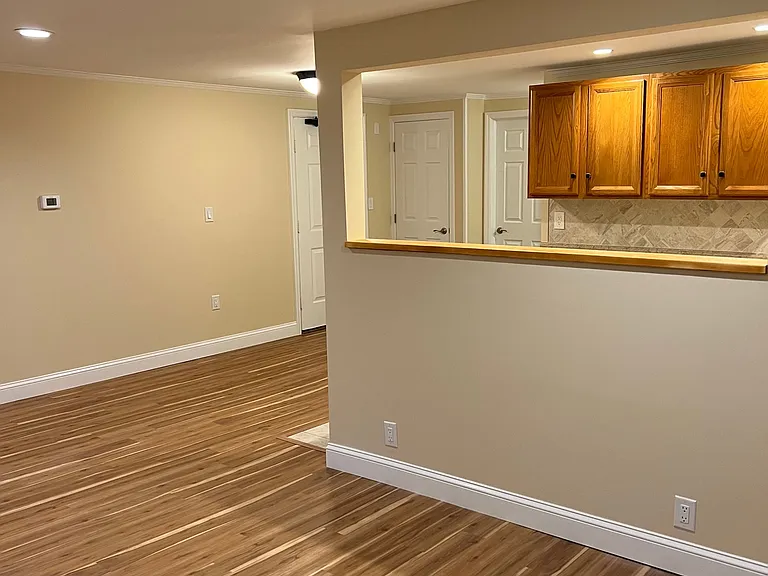 Living Room with view to galley kitchen