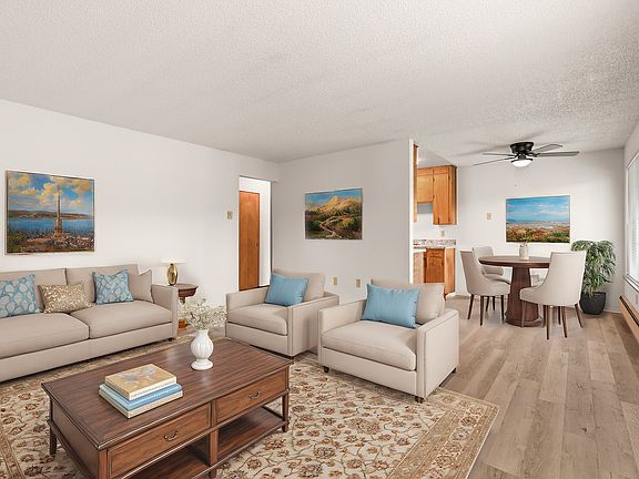 Experience comfort and elegance in this beautifully designed living and dining space.