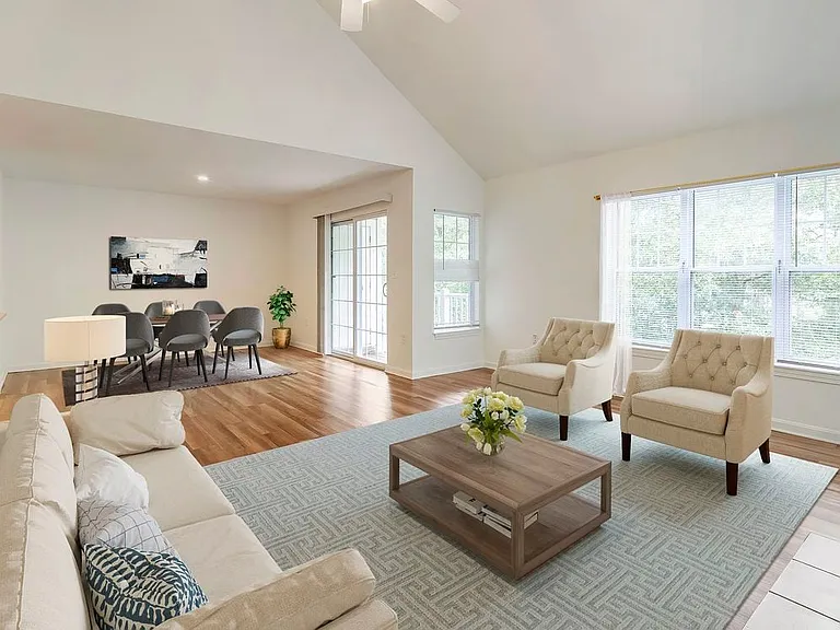 Renovated Package I living and dining area with hard surface flooring