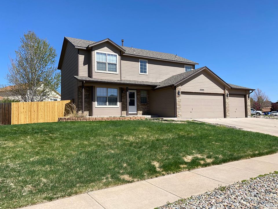 Front yard, 3-car garage