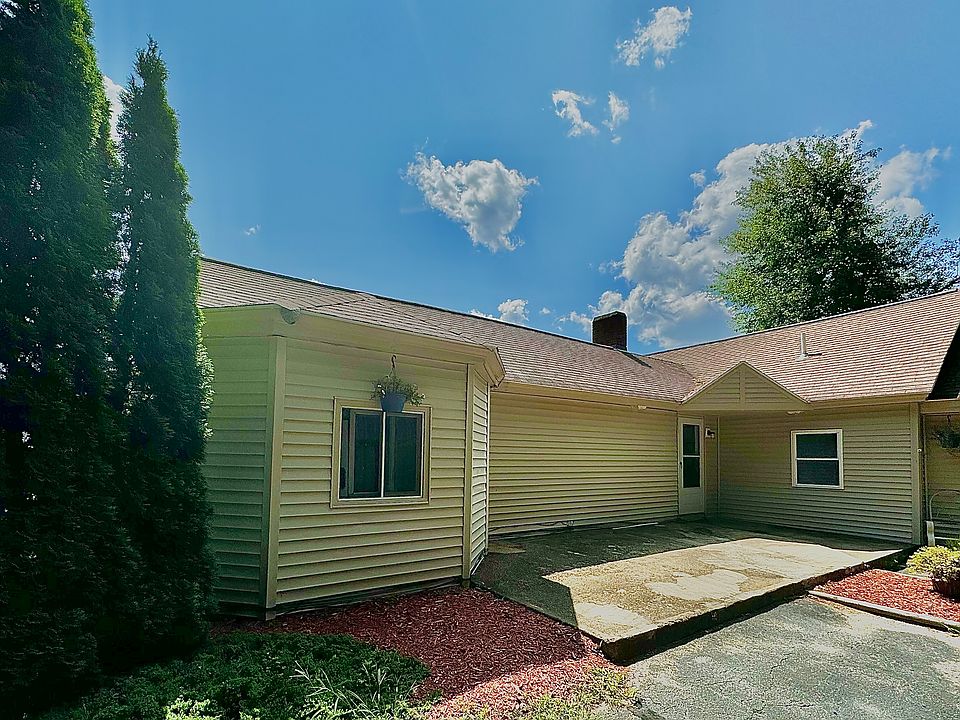 Front of unit featuring patio