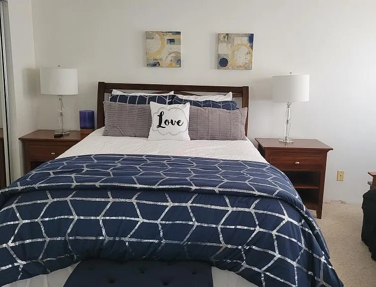 3rd bedroom with queen bed and futon.