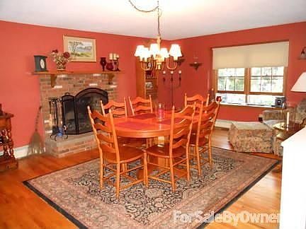Eating Area with fire place
						:
						Enjoy family dinners while enjoying a warm relaxing fire.