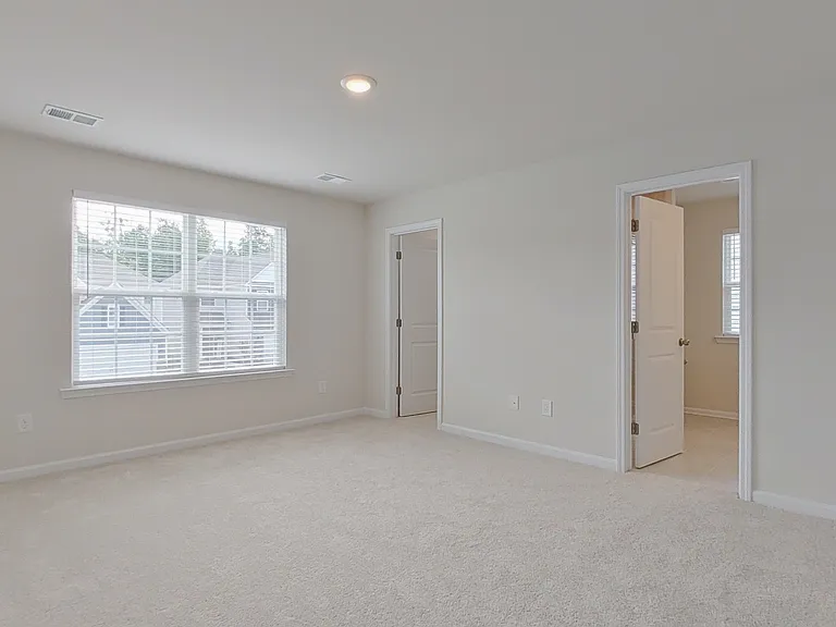 Master bedroom with two closets