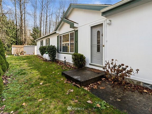 Front door on the left side of home.