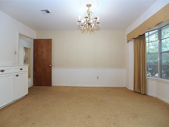 The formal dining has a great bay window and built-ins.