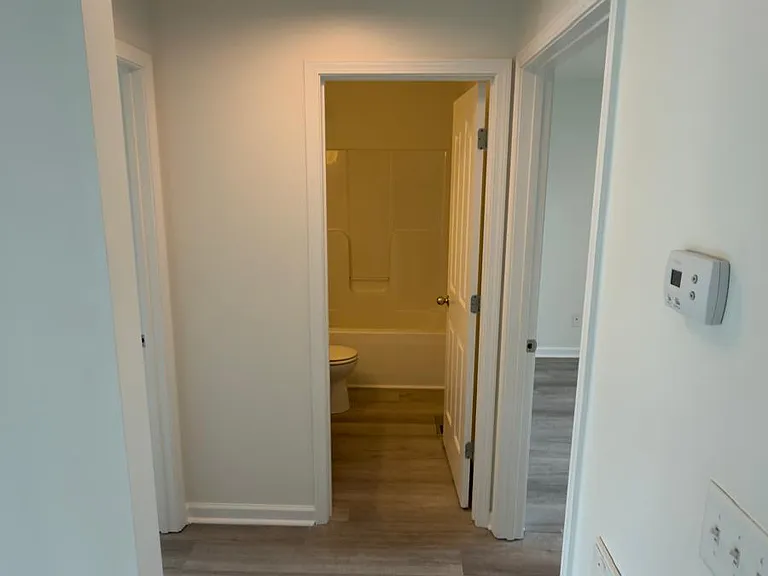 Hallway to 2nd and 3rd bedroom and 2nd bath