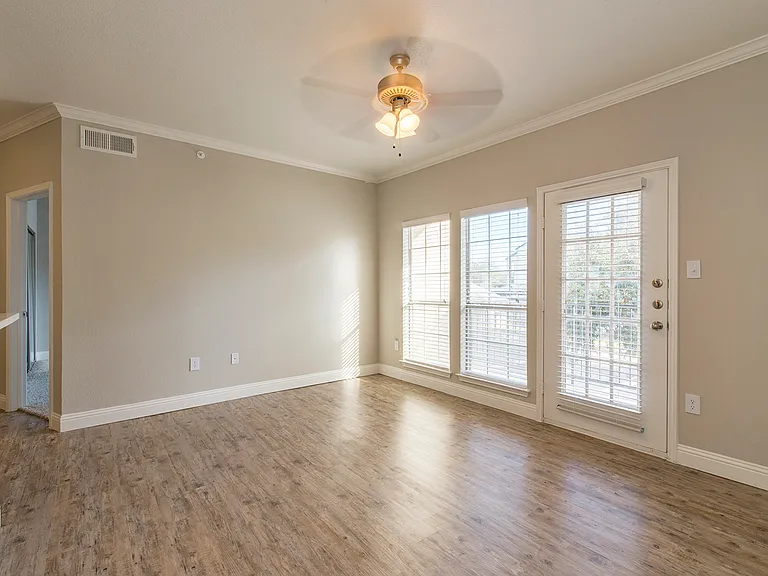 Bright living space with access to private balcony and natural light