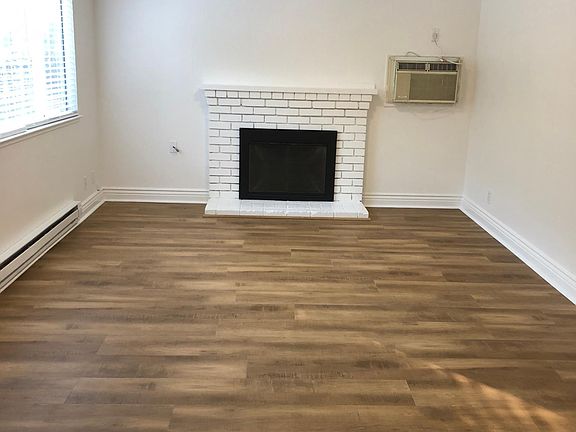 Living room with functional fireplace.