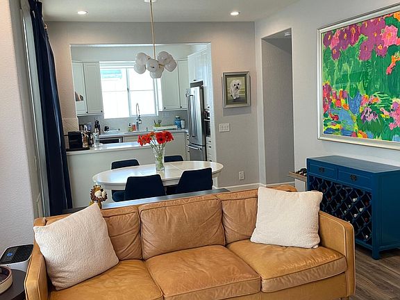 Dining table and blue cabinet (as wine storage)