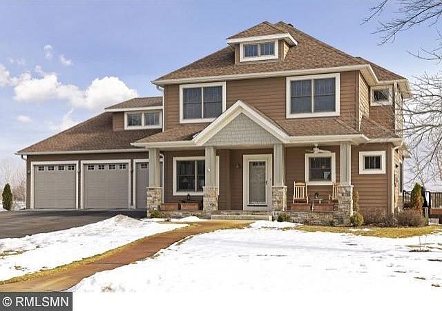 Custom Mega Homes built 2003. 6 Car Garage - lower level garage has asphalt driveway access. Many custom features and updates! Private lot. Quiet neighborhood.