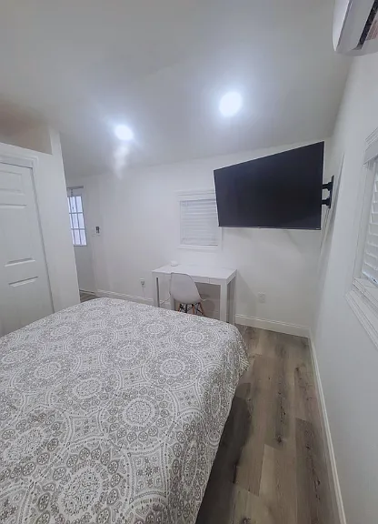 Includes closet, TV, air conditioning, and desk with chair.