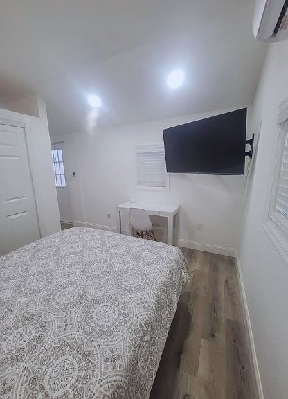 Includes closet, TV, air conditioning, and desk with chair.