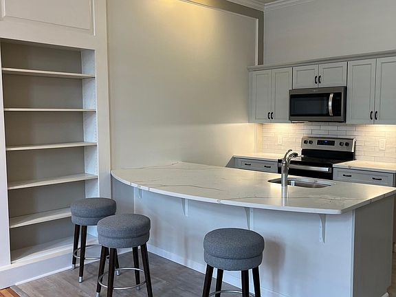 New Quartz Countertops and built in bookcase/shelves