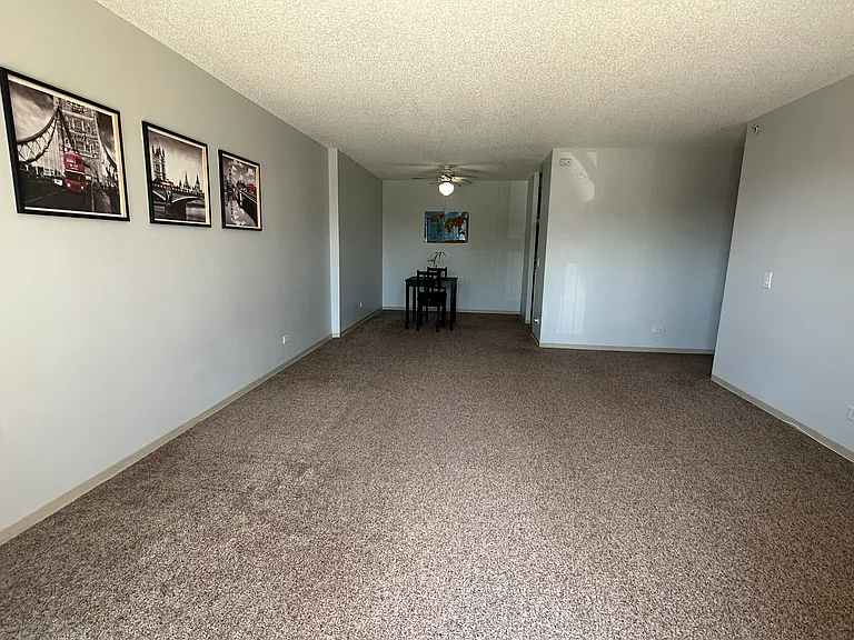 Living and dining room picture towards kitchen