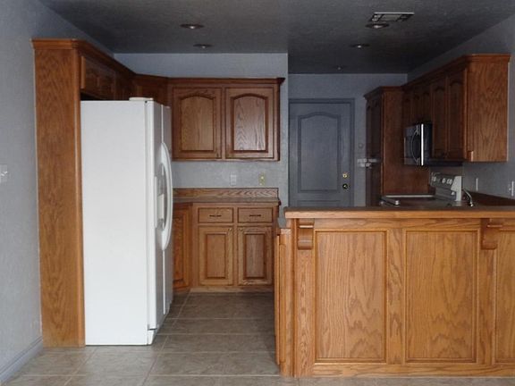 4th image of 6612 NW Willow Tree Cir