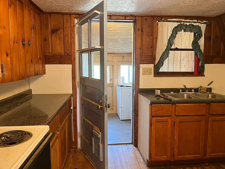 kitchenwith access to full laundry