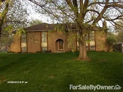 Brick Front with Vinyl Siding