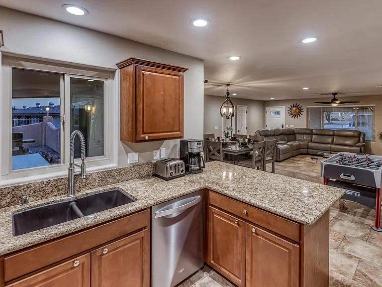 Well-designed open layout connects kitchen, dining, and living spaces effortlessly.