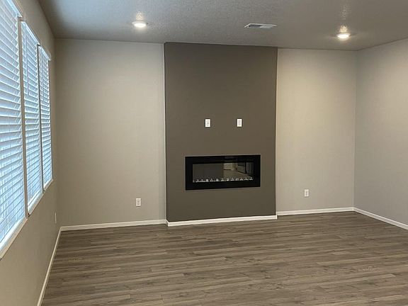 Great room with contemporary fireplace.