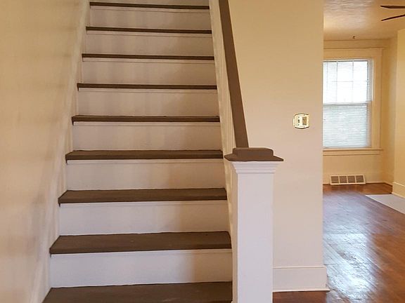 Staircase to second floor living room to right.