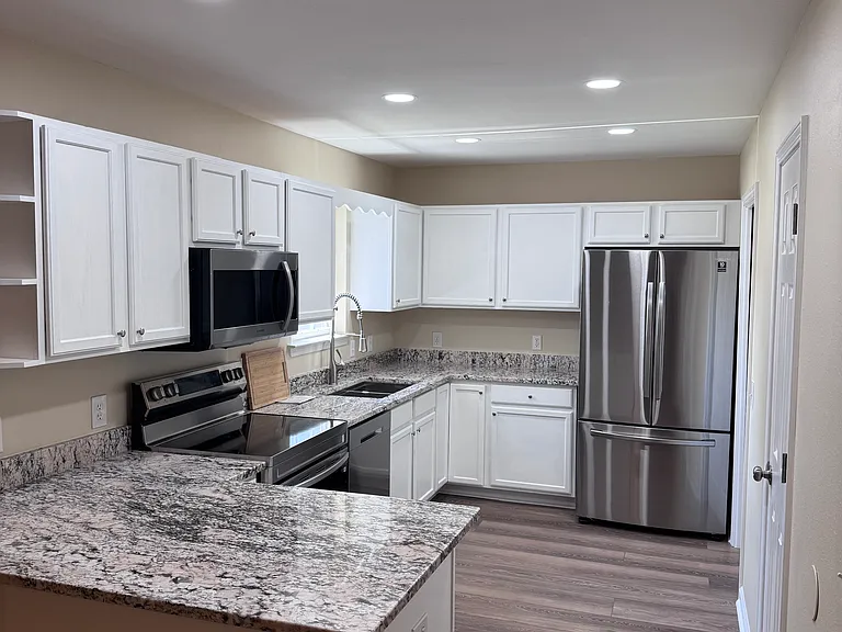 Kitchen with all new appliances and granite counter tops
