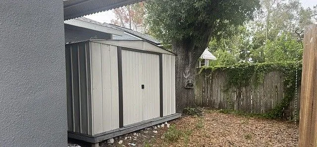 Utility shed plumbed for washer and dryer