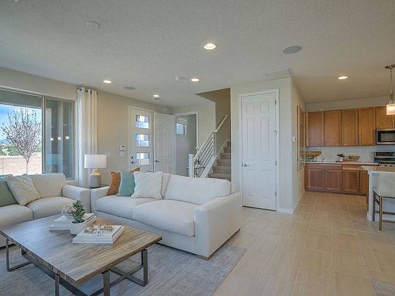 Easily entertain in the Senita home design with an open first floor that includes the kitchen, gathe