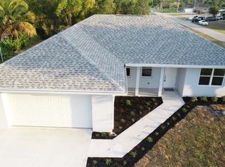 702 Manhattan St E, Lehigh Acres, FL 33974