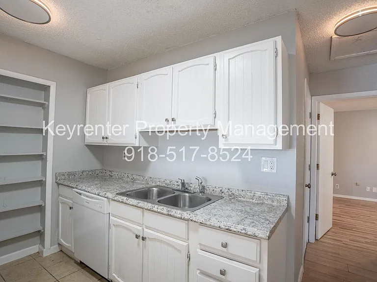 1448 S 108th East Pl — Photo 9