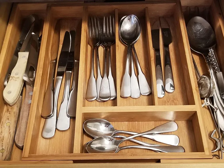 Setting for four plus additional knives, kitchen work tools, etc.