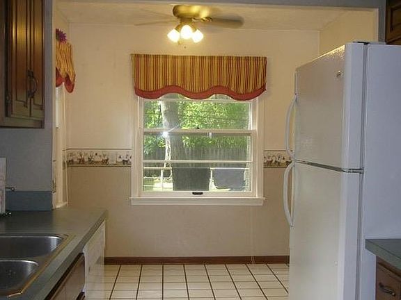 Kitchen looking to backyard