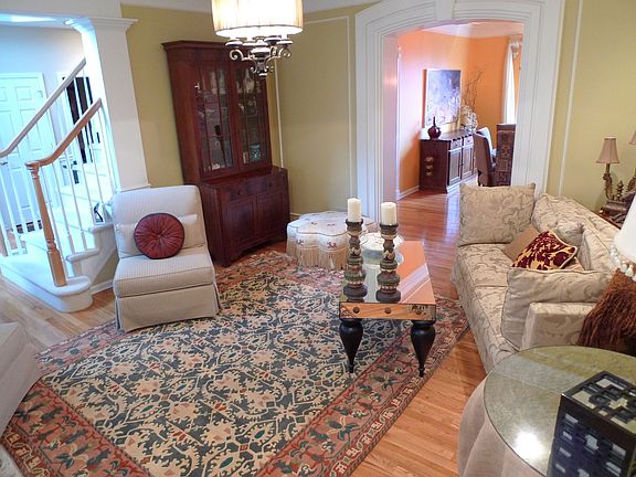 Formal Living Room with Beautiful entry archway and crown molding