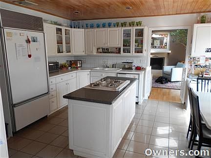 Sub-Zero & Kitchenaid, wood & window cabinets!