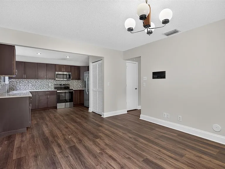 587 NW 38th Ave — Photo 8
