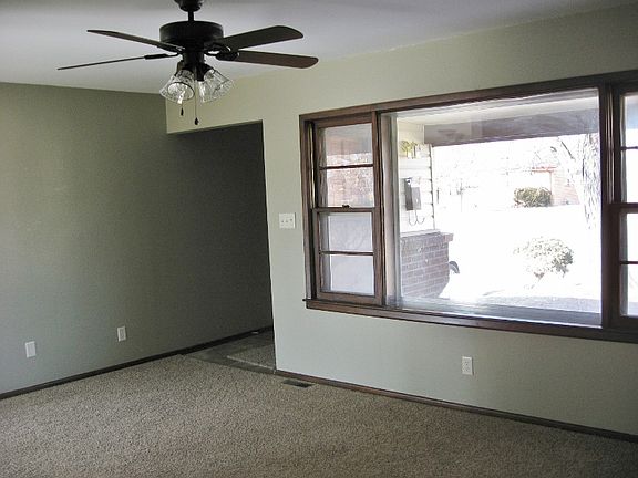 Nice sized living room has NEW Carpet!