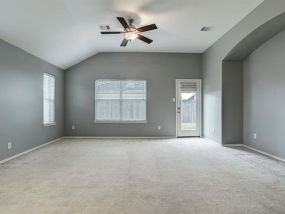 Living area leading to back yard. This home has been repainted throughout in 12/2019.