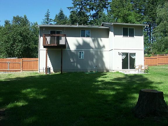 Back facing Back of HomeDeck View Park Like Borders 35 Acres Trees