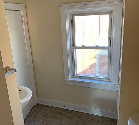 bathroom - Shower is on the side wall adjacent to the toilet