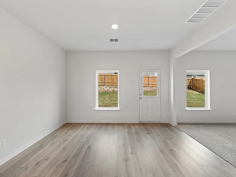 The dining room sits right off of the kitchen.