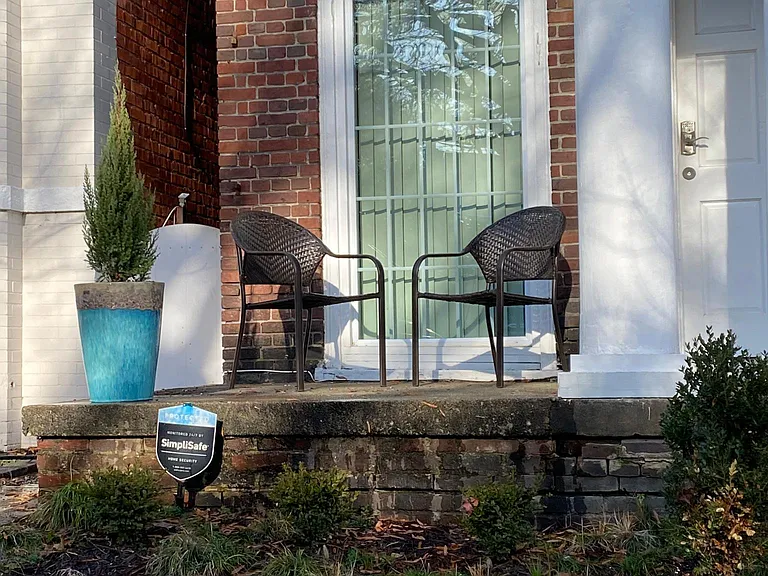 Morning coffee from your own patio overlooking Grace St.