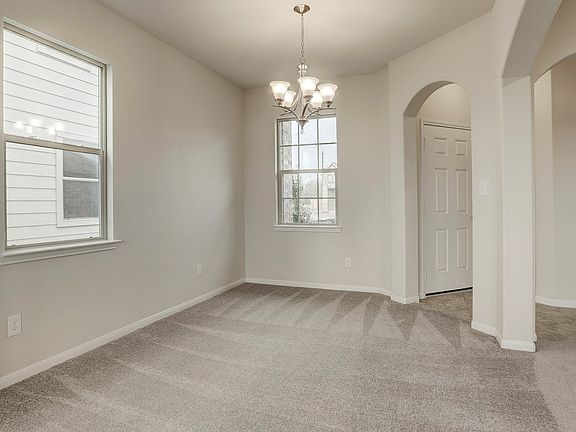 Dining room tucked off foyer
