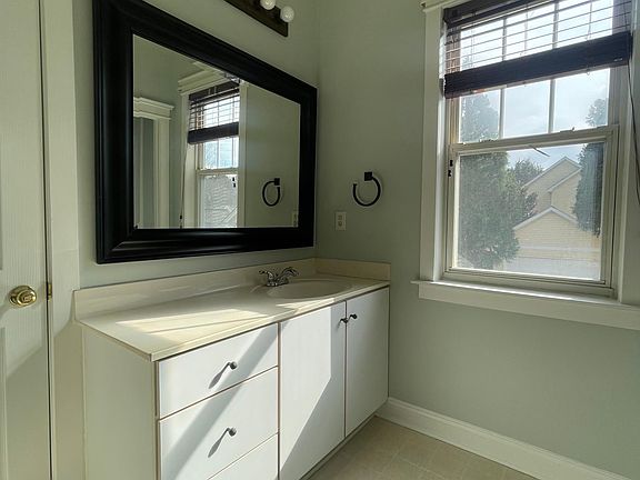 Well lit primary bath vanity