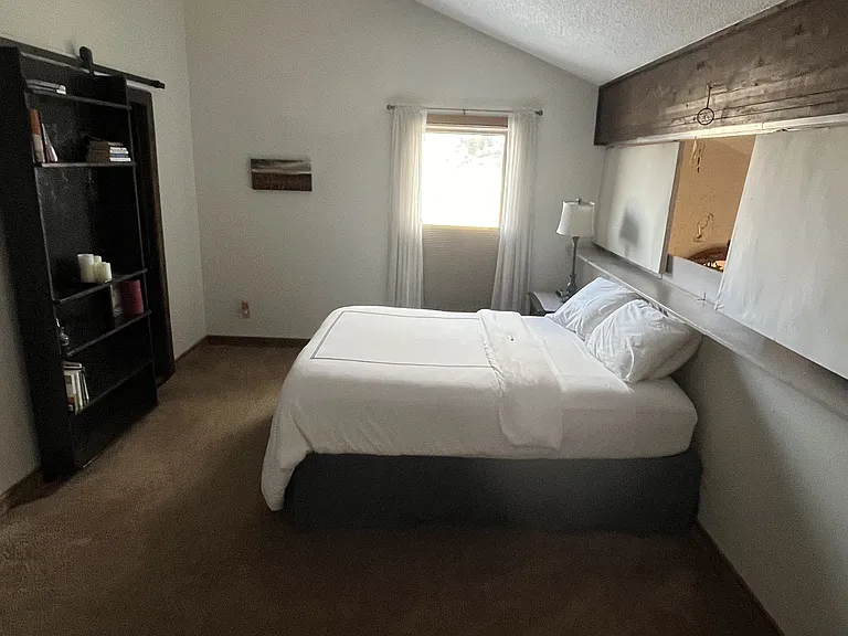Big upstairs bedroom with sliding sound panels to close the loft off, or open it up for light when you wish! Bathroom upstairs as well.
