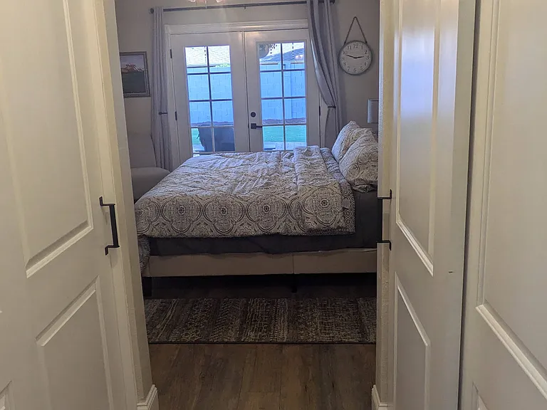 Master bedroom, his and hers closets