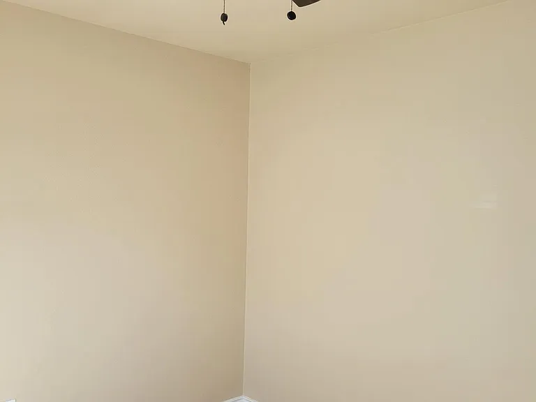 guess room with new ceiling fan.