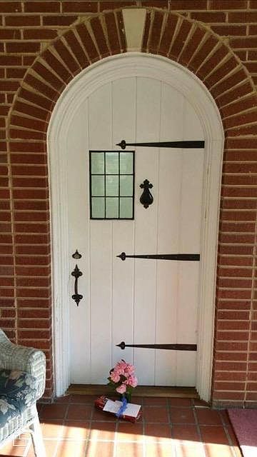 Front door from screened/glassed in porch