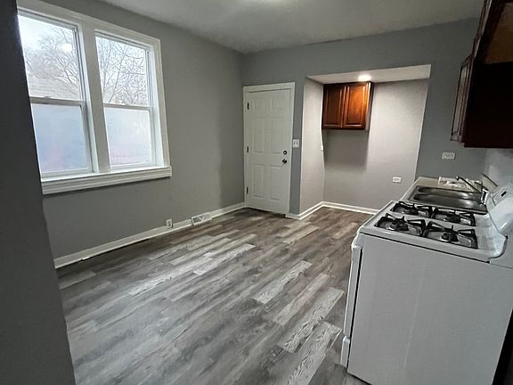 3rd image of 10801 S Burley Ave Rear 2